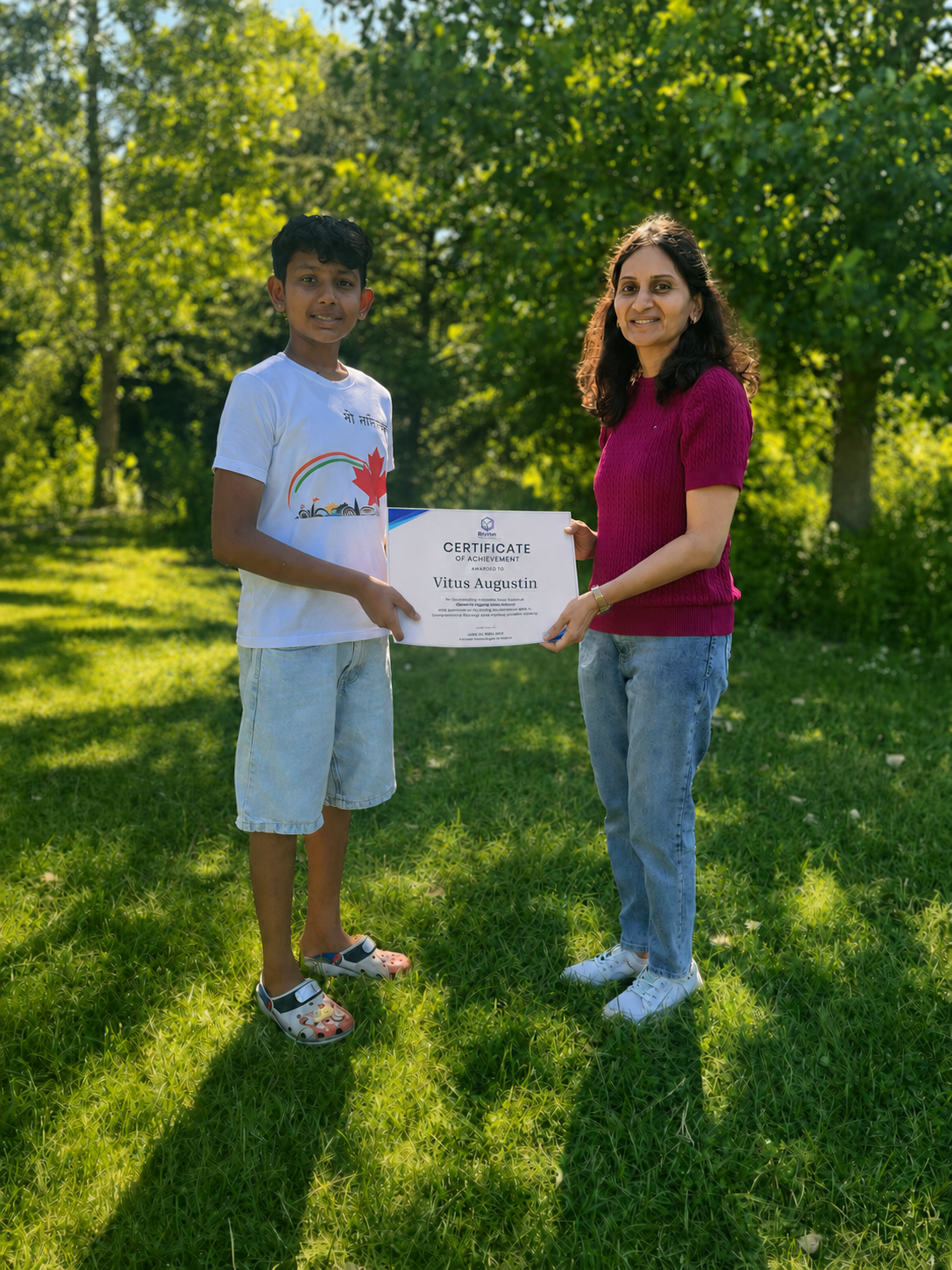 Ruvion student Vitus receiving his Certificate of Achievement after completing the Scratch coding course